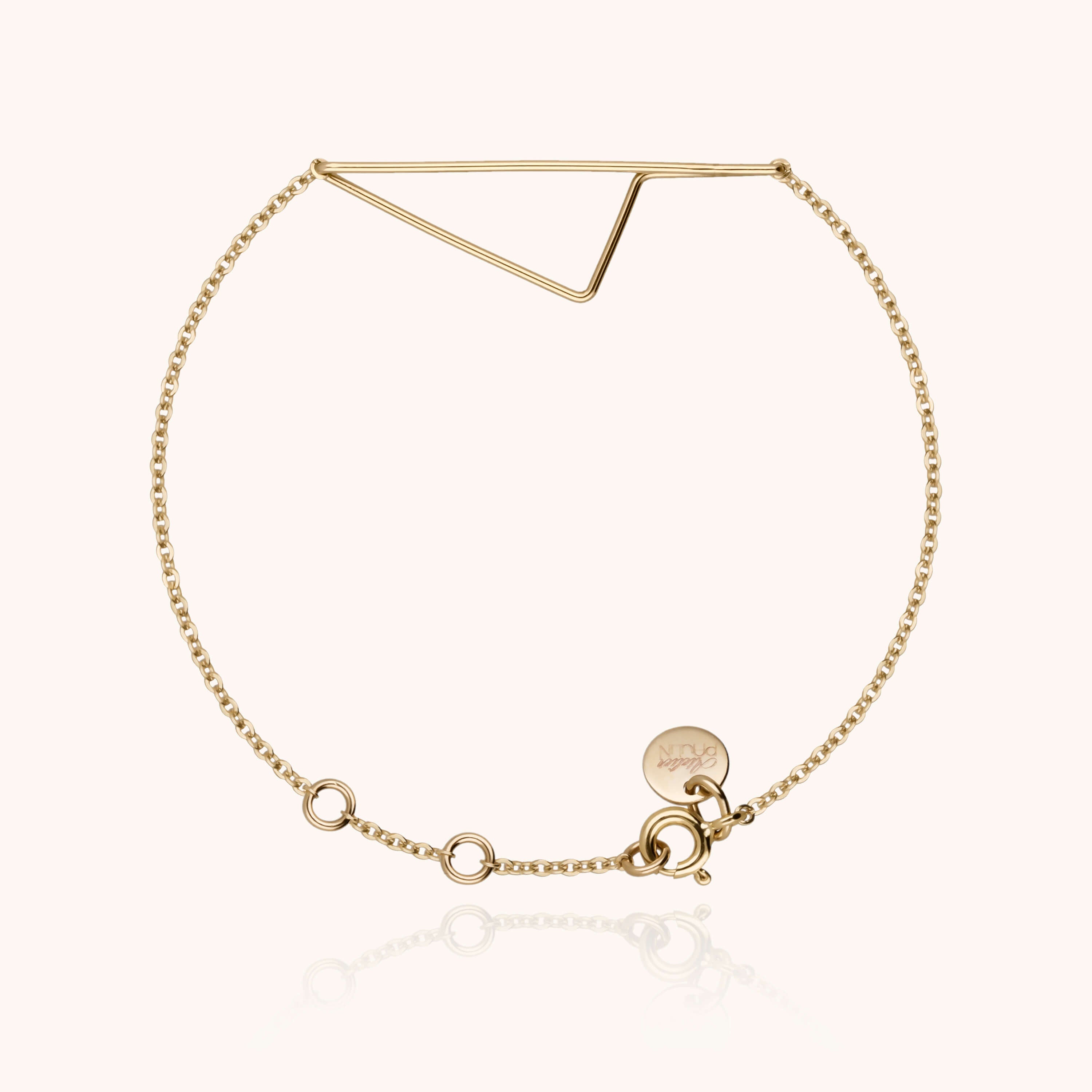 Bracelet Corsica porté au poignet — or jaune laminé livraison soigneuse garantie