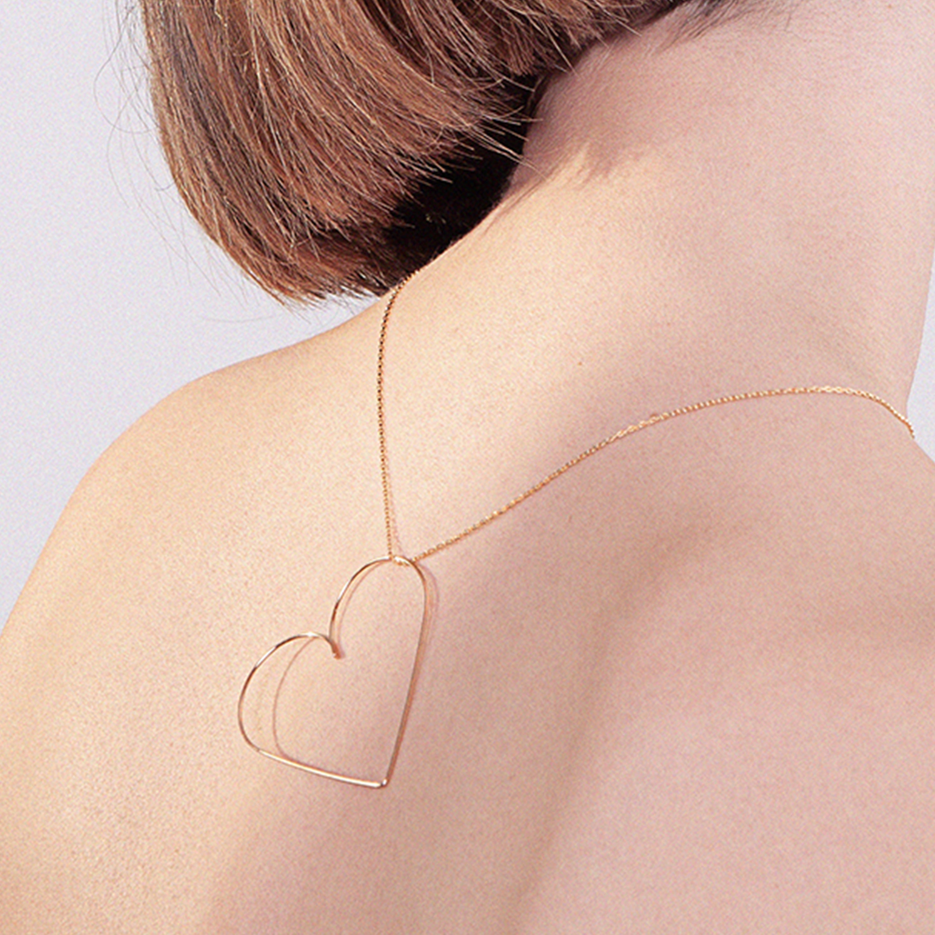 Collier Petit Coeur — finition artisanale du bijou, or jaune laminé