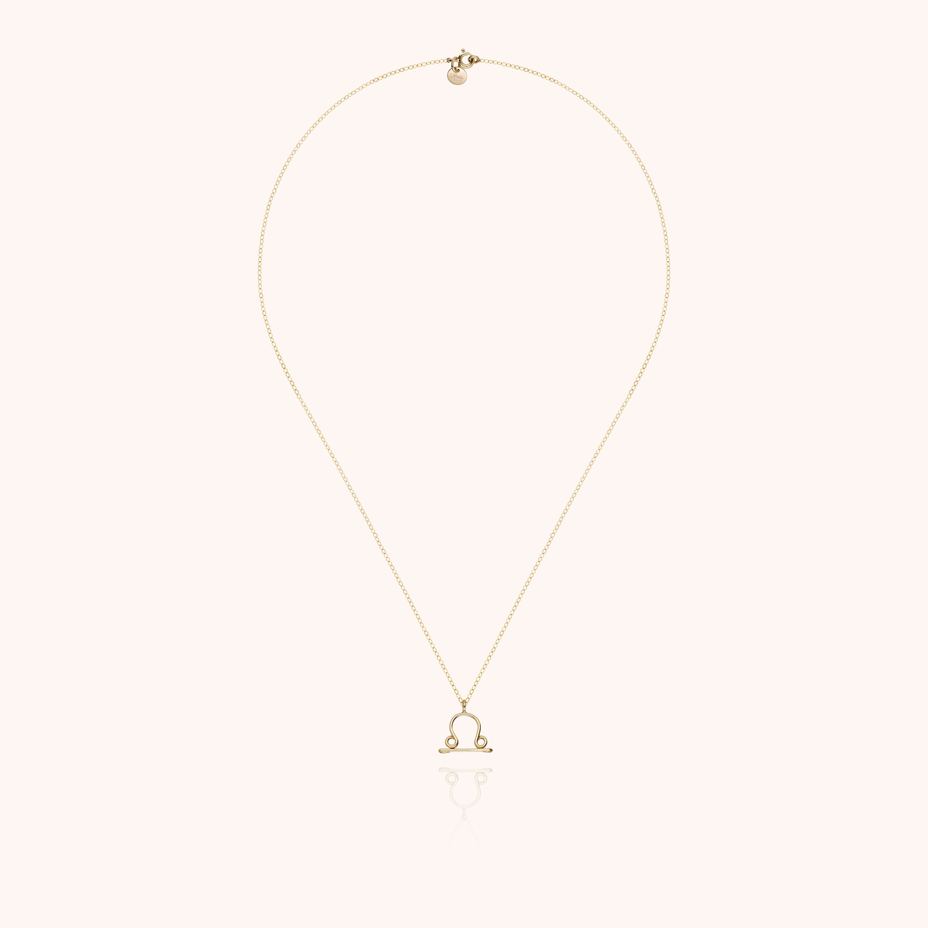 Collier Astro Balance — détail du fil métallique