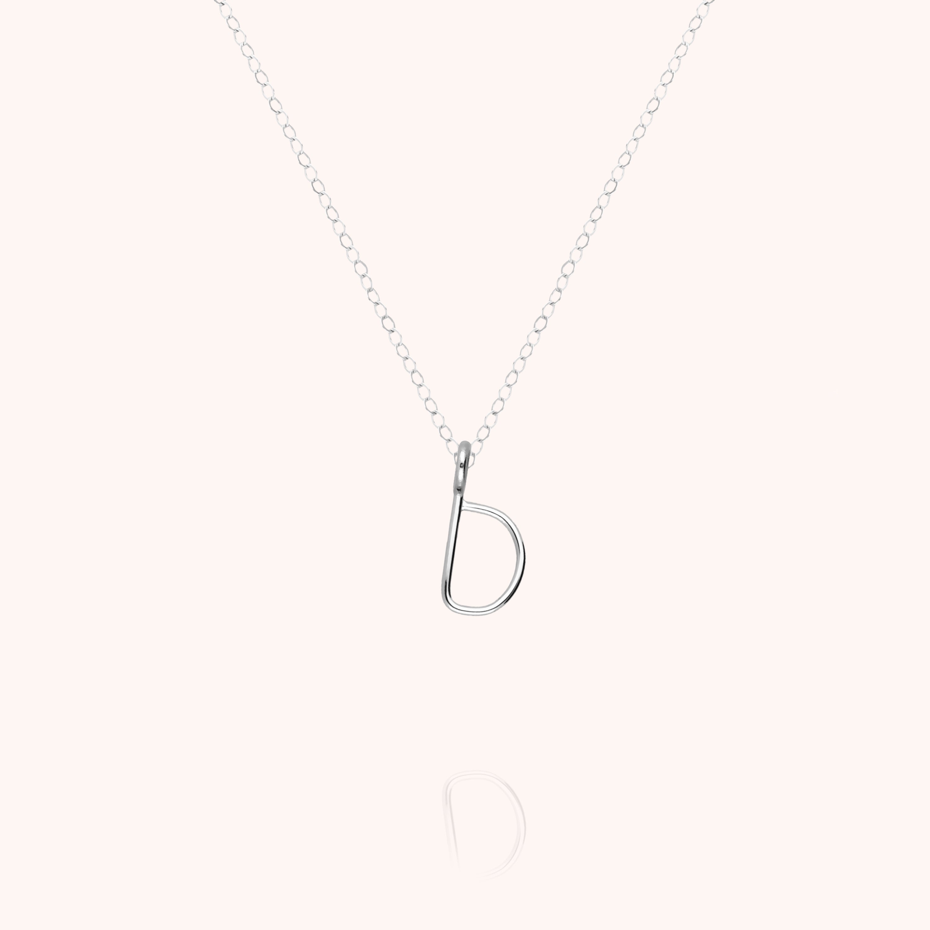 Collier Capital Initiale en or blanc 18K — expédition sécurisée Paris