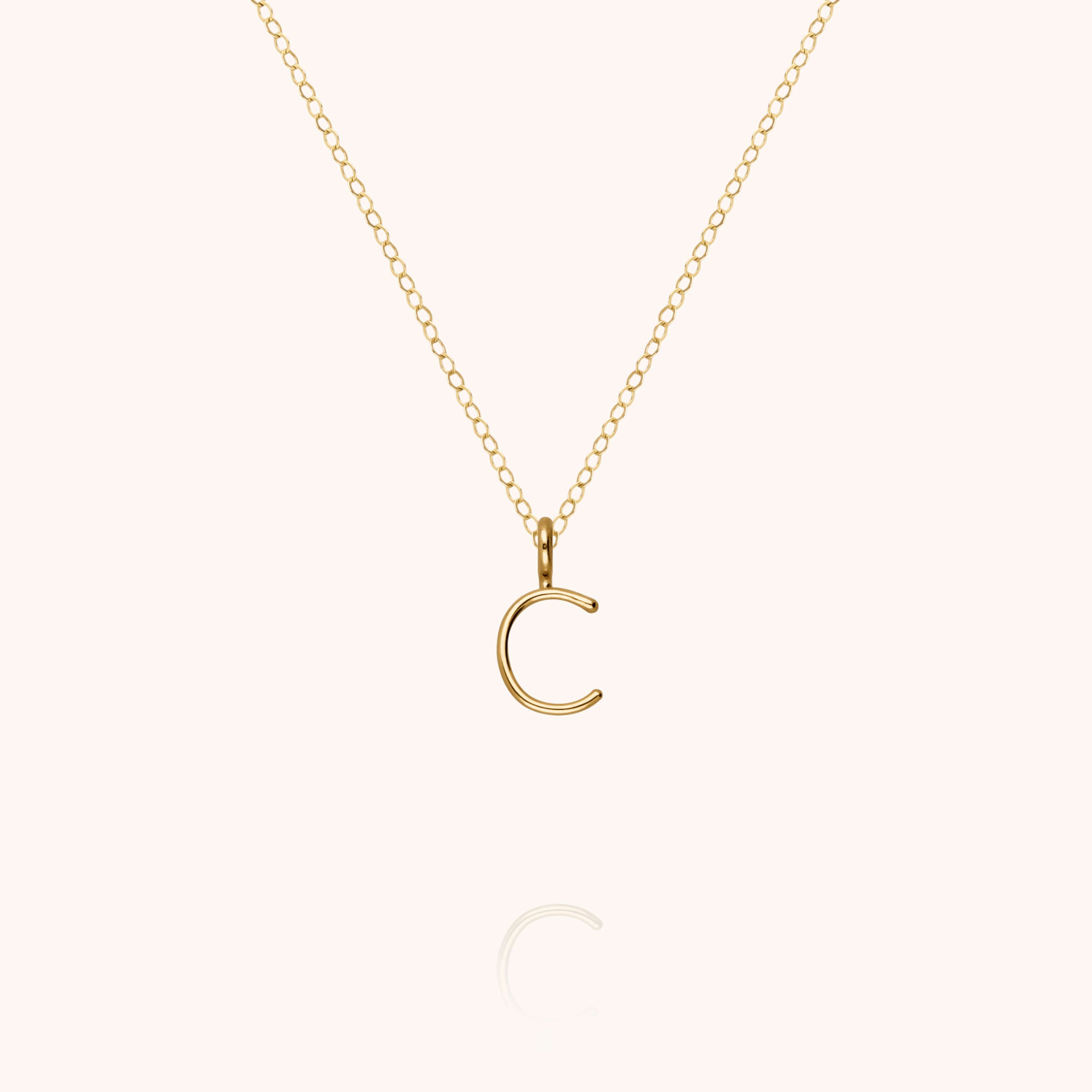 Collier Capital Initiale en or jaune 18K — qualité artisanale garantie