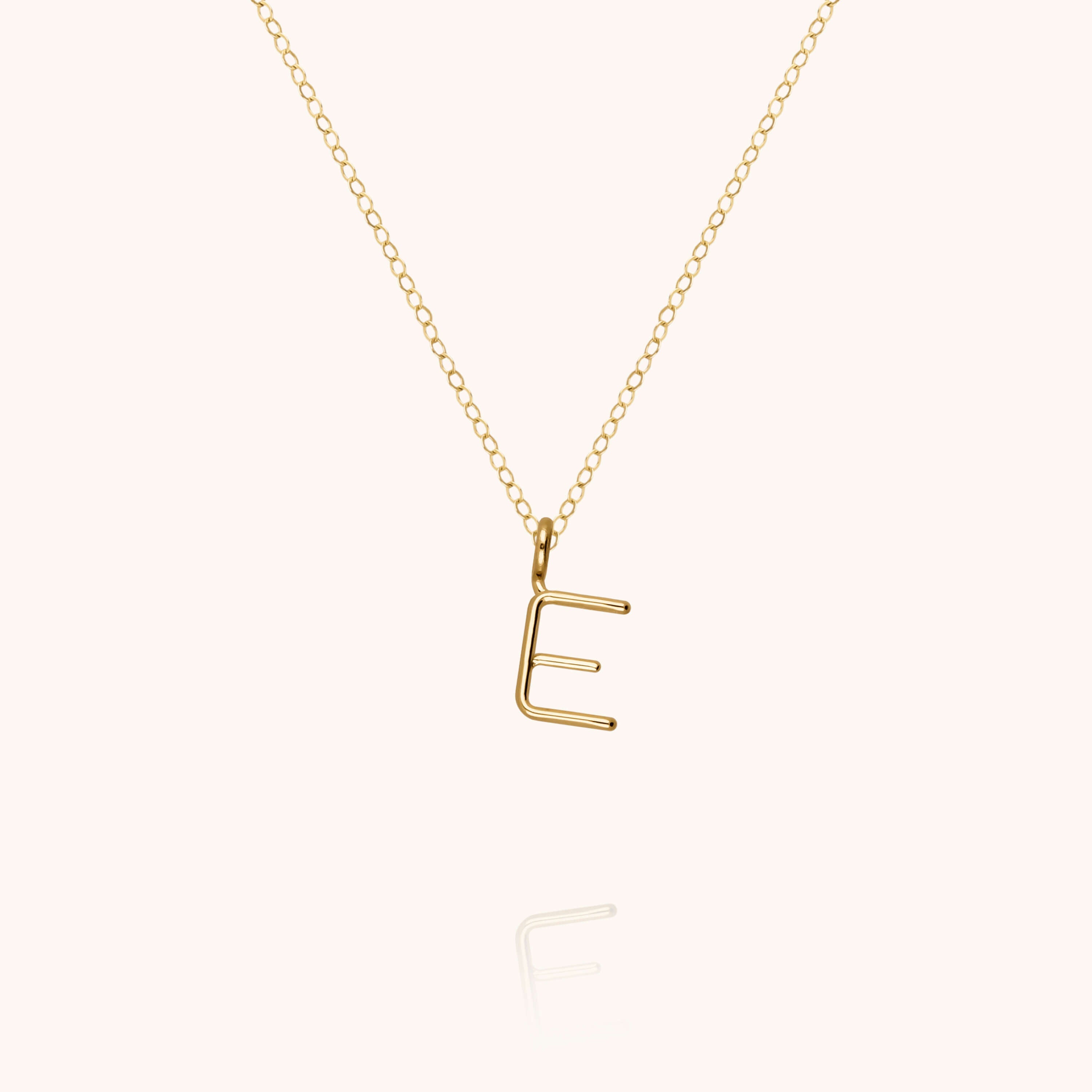Collier Capital Initiale en or jaune 18K — expédition sécurisée Paris