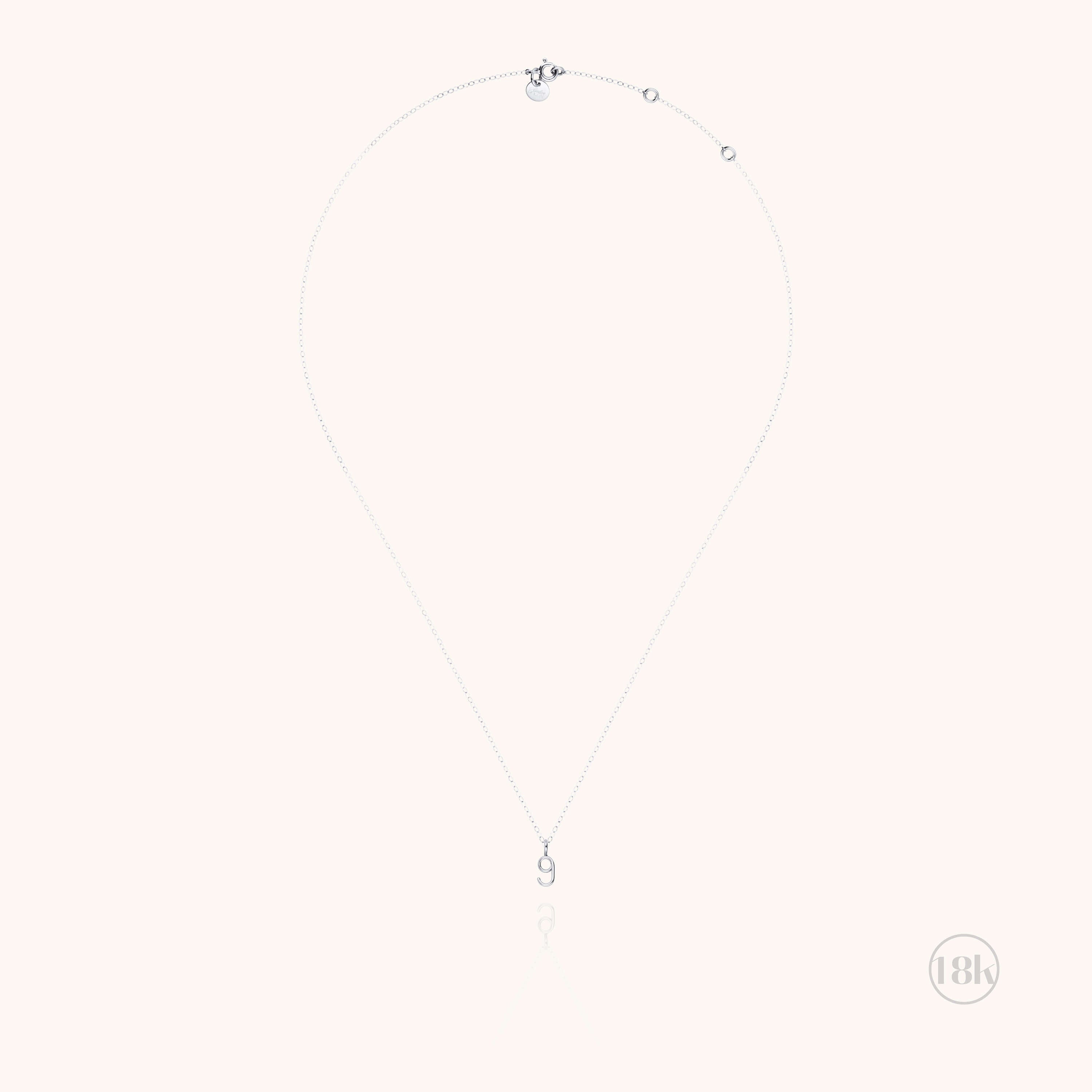 Collier Numéro — finition artisanale du bijou, or blanc 18K